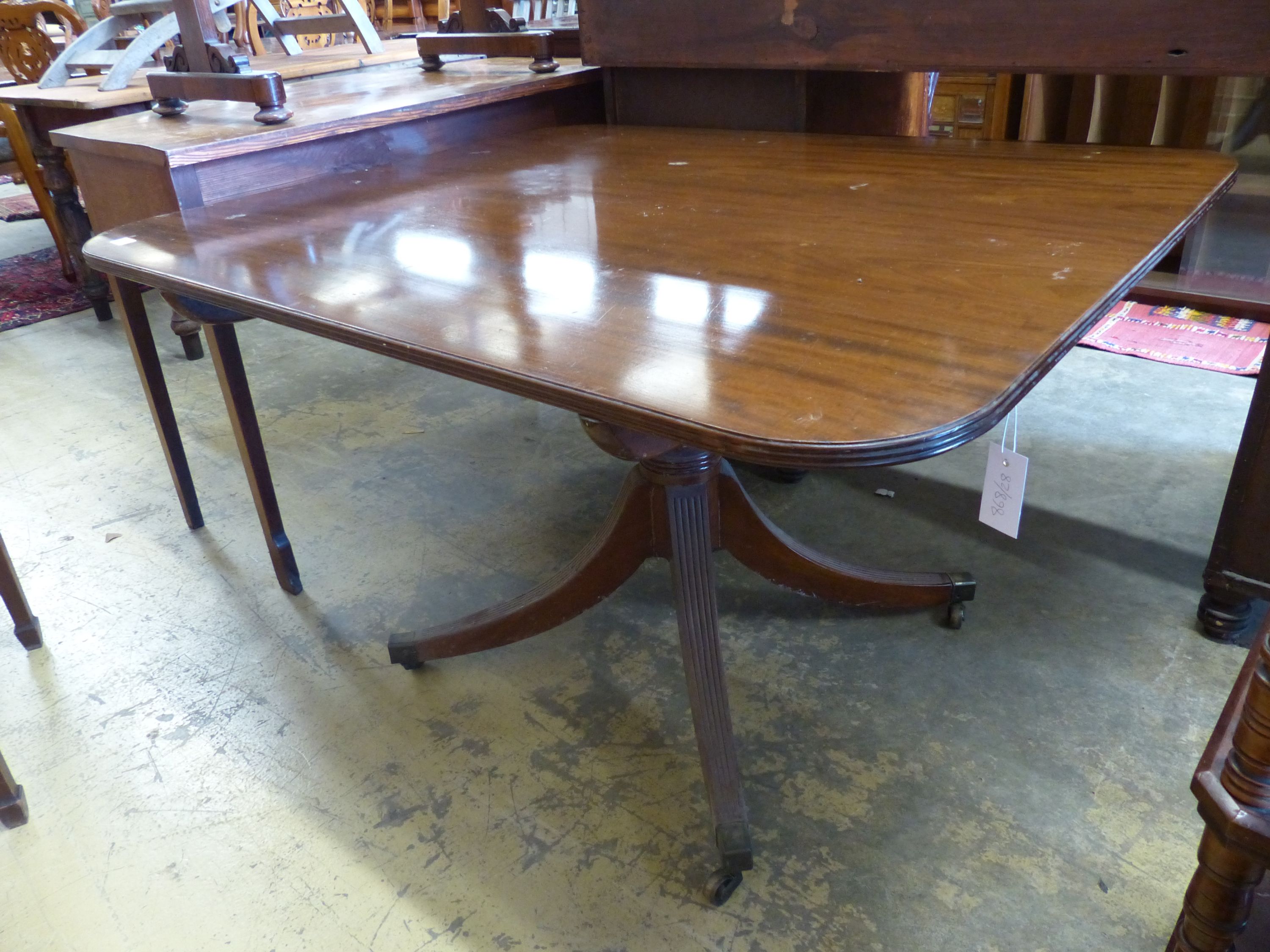 A George III design rectangular mahogany tilt top breakfast table, length 118cm, width 100cm, height 70cm